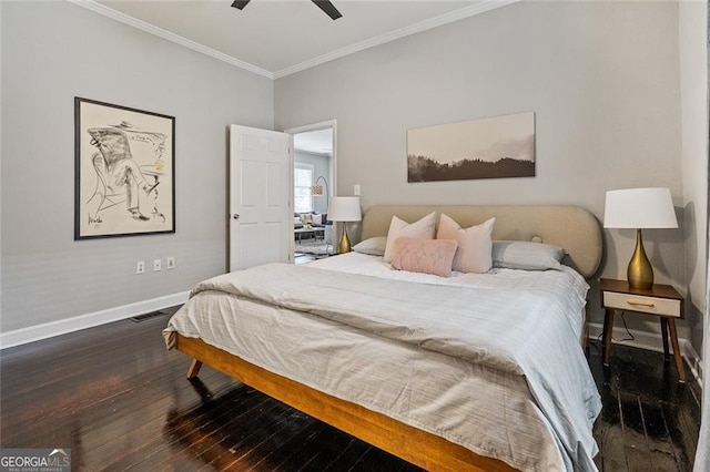 bedroom with ceiling fan, dark hardwood / wood-style flooring, and crown molding