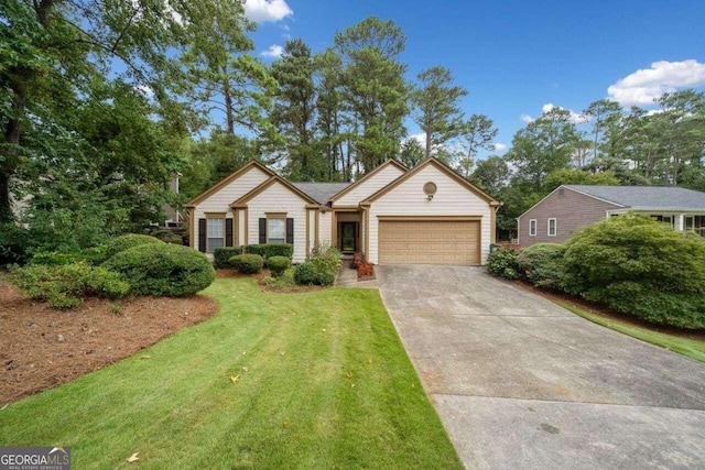 ranch-style house with a front yard and a garage