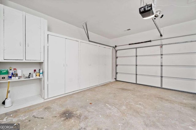 garage with a garage door opener