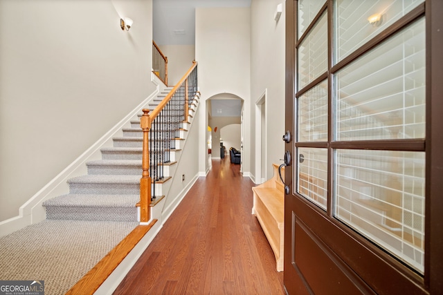 entrance foyer featuring hardwood / wood-style floors