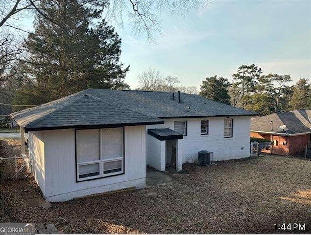 back of property featuring cooling unit