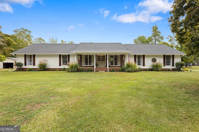 single story home with a front lawn and covered porch