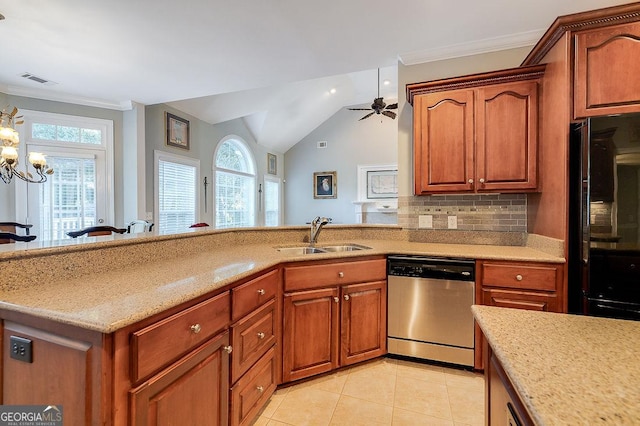 kitchen featuring decorative backsplash, ceiling fan with notable chandelier, sink, dishwasher, and lofted ceiling