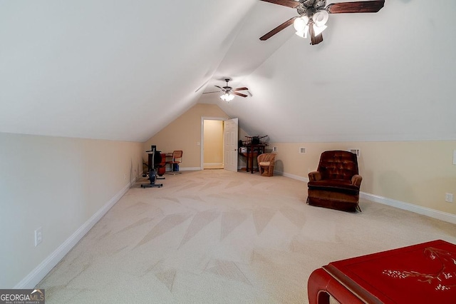 living area with carpet floors, ceiling fan, and lofted ceiling