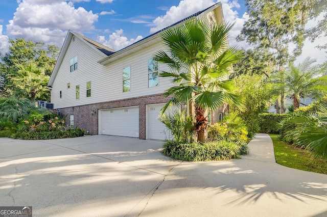 view of property exterior with a garage