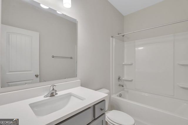 full bathroom with shower / tub combination, vanity, and toilet