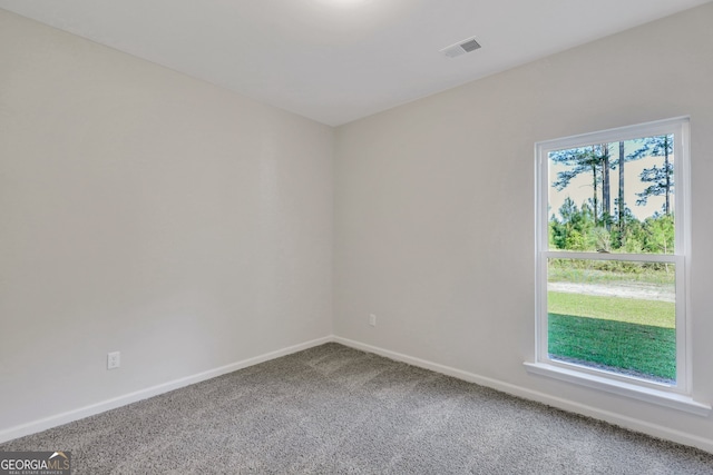 empty room featuring carpet