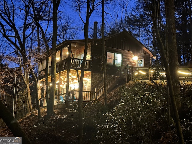 view of property exterior at twilight