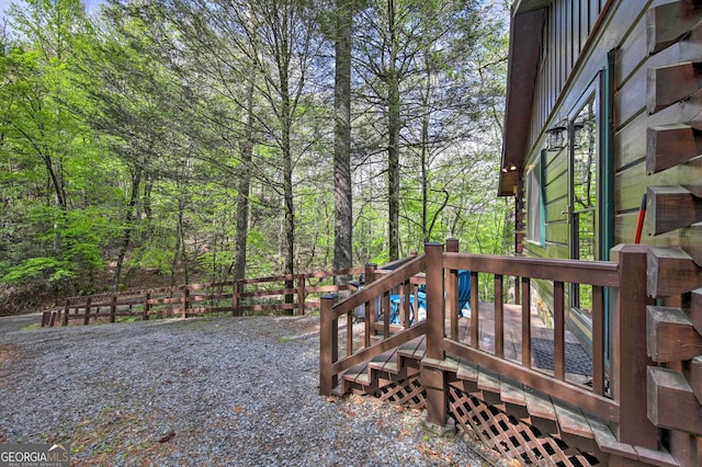 view of yard featuring a wooden deck