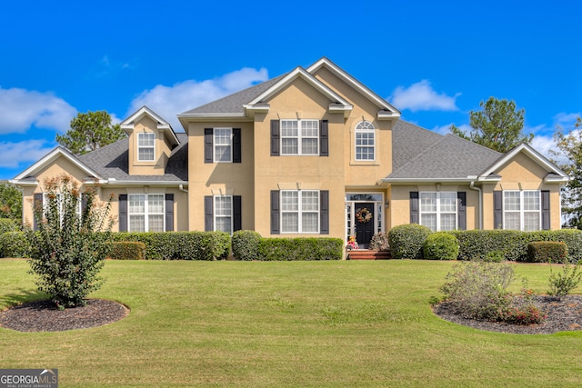 view of front of house with a front yard