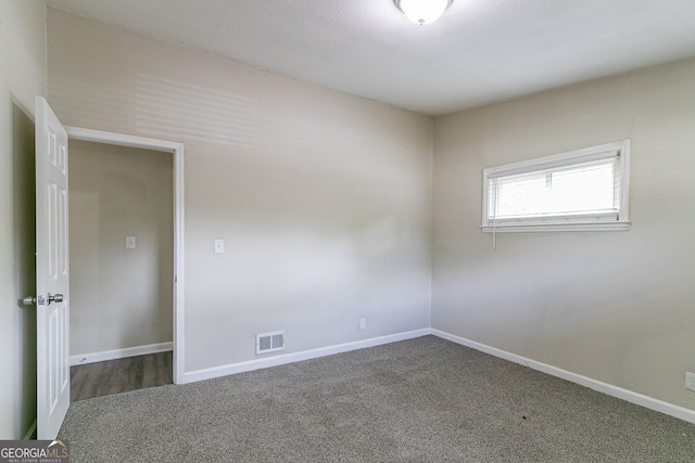 1278 Lynwyn Ln SE, Atlanta, GA 30316 - unfurnished room featuring visible vents, baseboards, and carpet