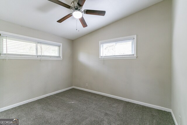1278 Lynwyn Ln SE, Atlanta, GA 30316 - spare room with lofted ceiling, carpet, baseboards, and a wealth of natural light