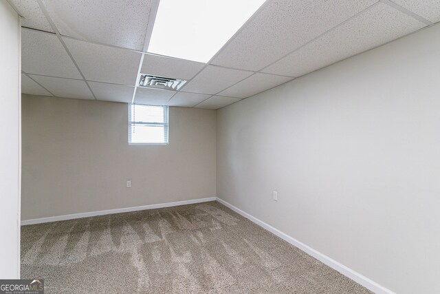1278 Lynwyn Ln SE, Atlanta, GA 30316 - basement with a drop ceiling, visible vents, baseboards, and carpet floors