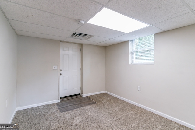 1278 Lynwyn Ln SE, Atlanta, GA 30316 - below grade area featuring visible vents, carpet flooring, a paneled ceiling, and baseboards