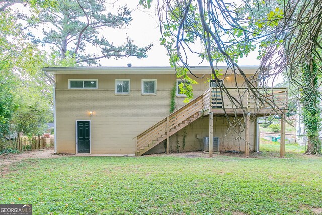 1278 Lynwyn Ln SE, Atlanta, GA 30316 - back of property with stairway, a yard, cooling unit, and fence