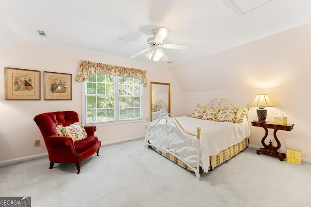 bedroom featuring ceiling fan, lofted ceiling, and carpet