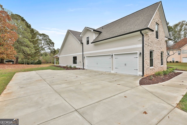 view of property exterior with a garage