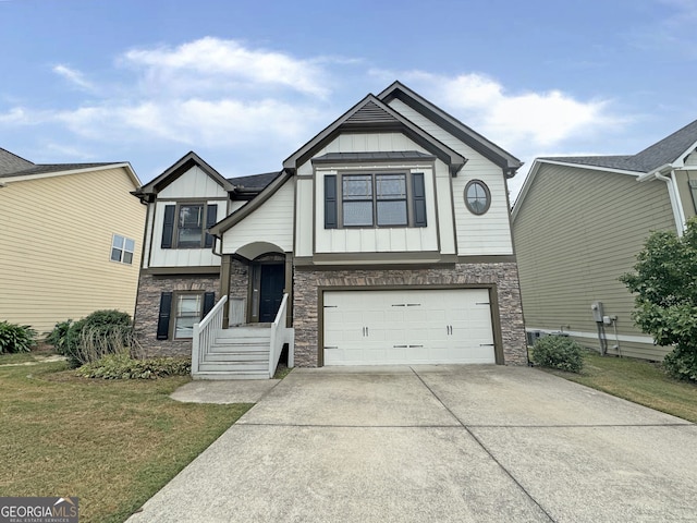 view of front of property with a front lawn and a garage