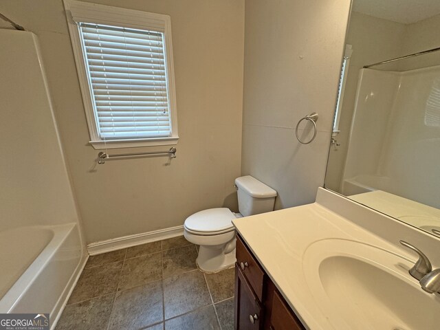 full bathroom featuring tile patterned flooring, shower / tub combination, vanity, and toilet