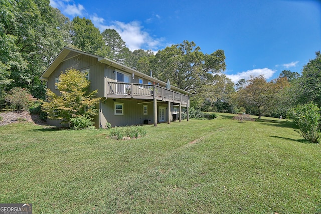 view of yard featuring a wooden deck