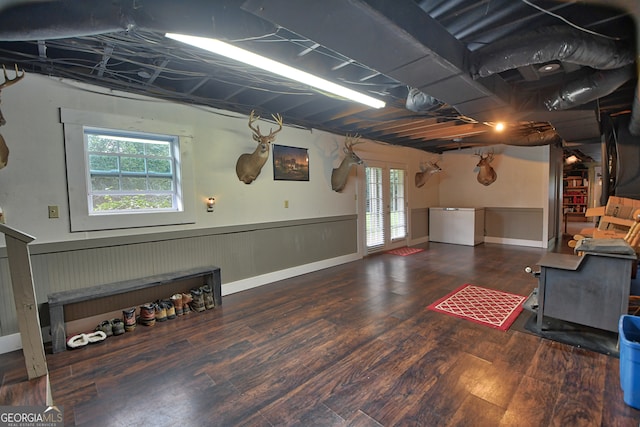 interior space featuring french doors, dark hardwood / wood-style floors, and a wealth of natural light