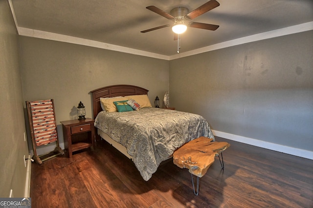 bedroom featuring dark hardwood / wood-style floors and ceiling fan