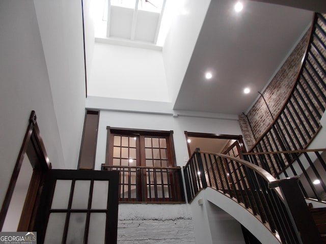 140 Walker St SW Unit A, Atlanta, GA 30313 - stairs featuring a high ceiling and recessed lighting