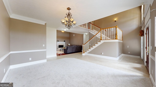 interior space featuring a notable chandelier and crown molding