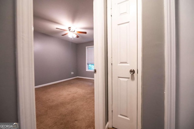 interior space featuring ceiling fan