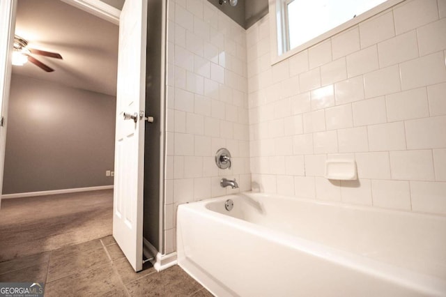 bathroom with shower / tub combination and ceiling fan