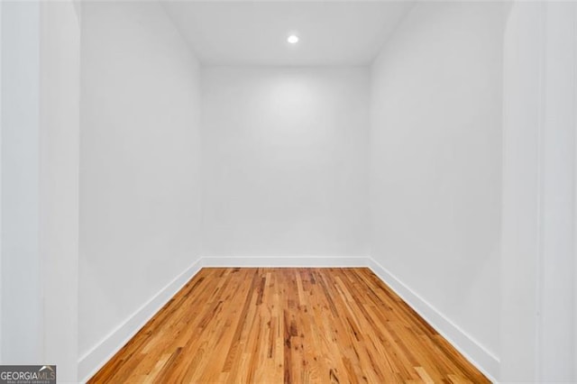 empty room featuring hardwood / wood-style flooring