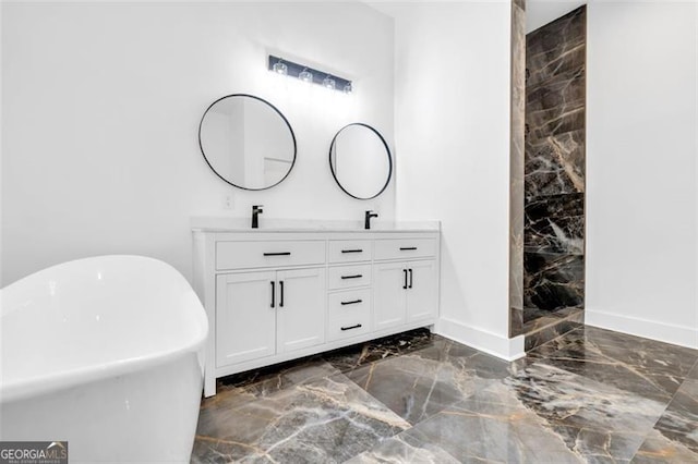 bathroom featuring a bathtub and vanity