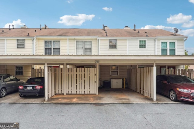 view of front of property featuring a carport