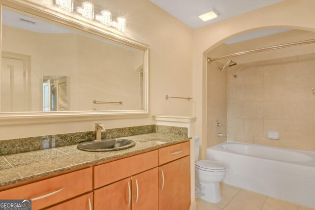 unfurnished bedroom with crown molding, light carpet, a closet, and ceiling fan