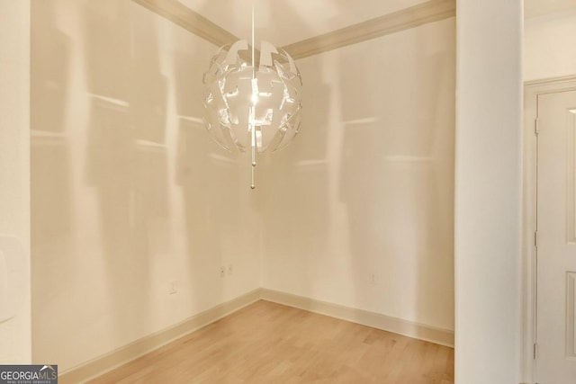 unfurnished dining area featuring hardwood / wood-style floors