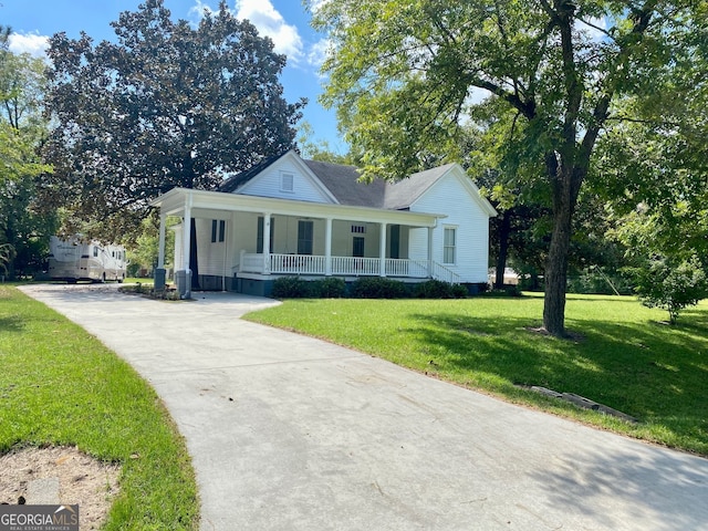 view of front of home with a front lawn and covered porch