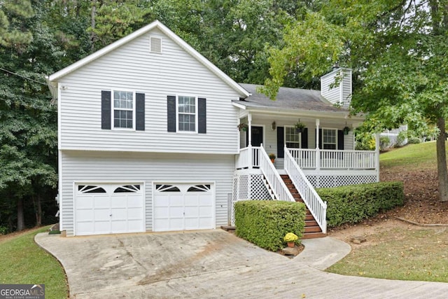 view of front facade featuring a garage and covered porch