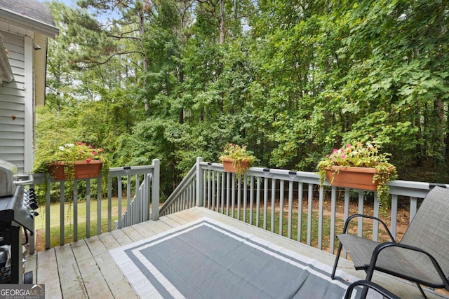 deck featuring a lawn