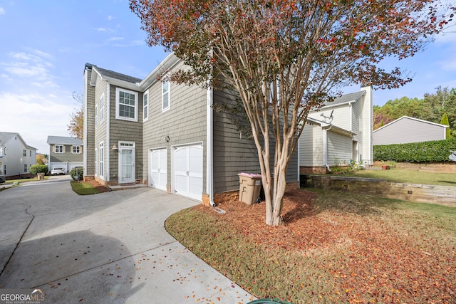 view of home's exterior with a garage