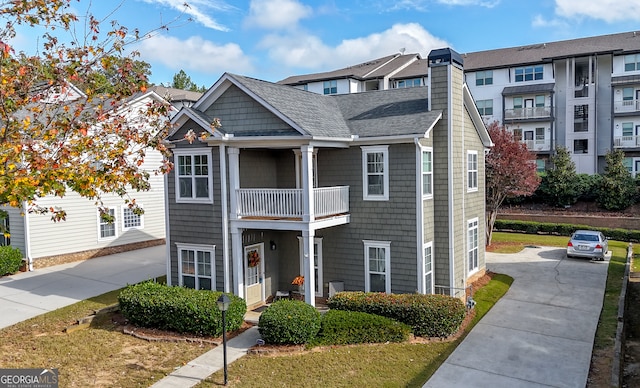 multi unit property featuring a balcony