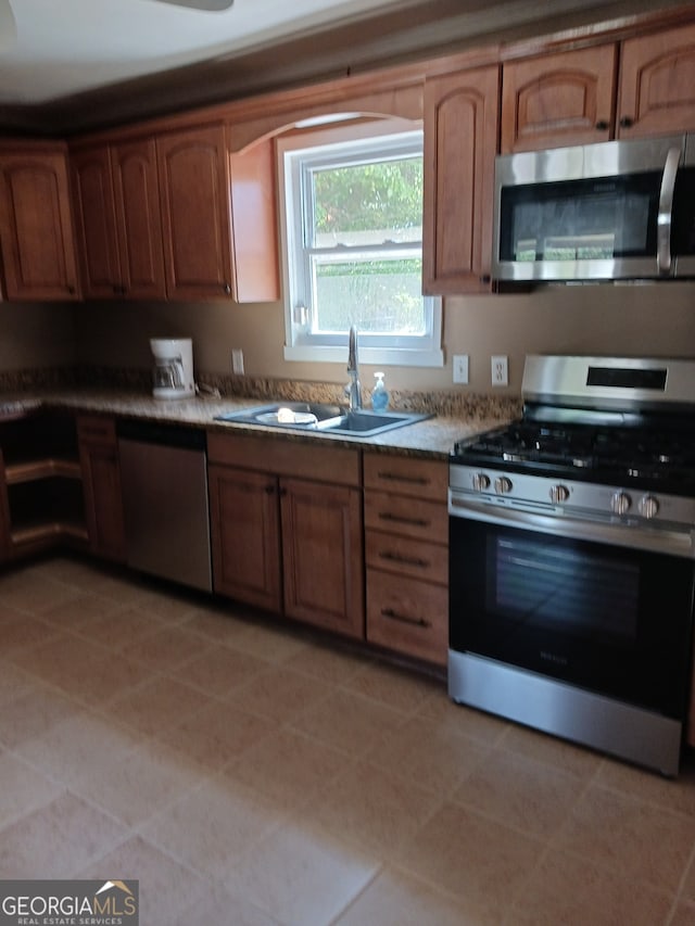 kitchen featuring appliances with stainless steel finishes and sink