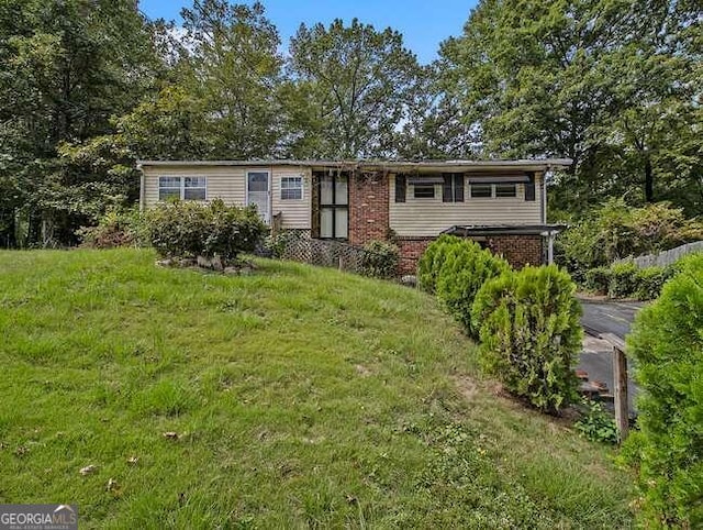 view of front of home with a front yard