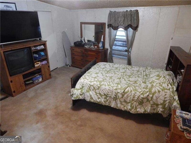 bedroom featuring carpet floors