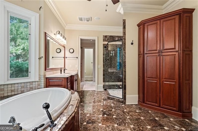 bathroom with ceiling fan, vanity, shower with separate bathtub, and crown molding