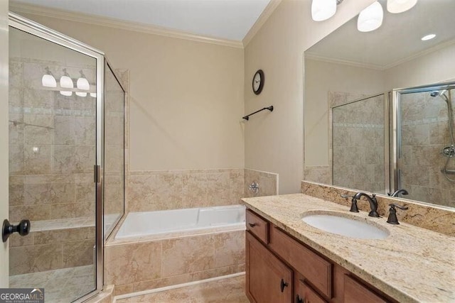 bathroom featuring independent shower and bath, vanity, and ornamental molding