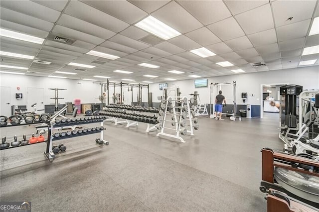 workout area with a drop ceiling