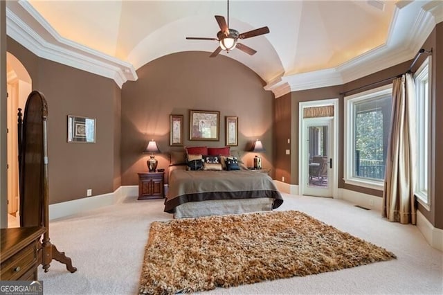 bedroom with light carpet, vaulted ceiling, ceiling fan, and crown molding