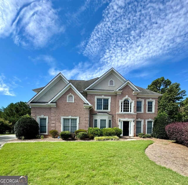 view of front facade with a front yard