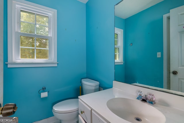 bathroom with vanity and toilet