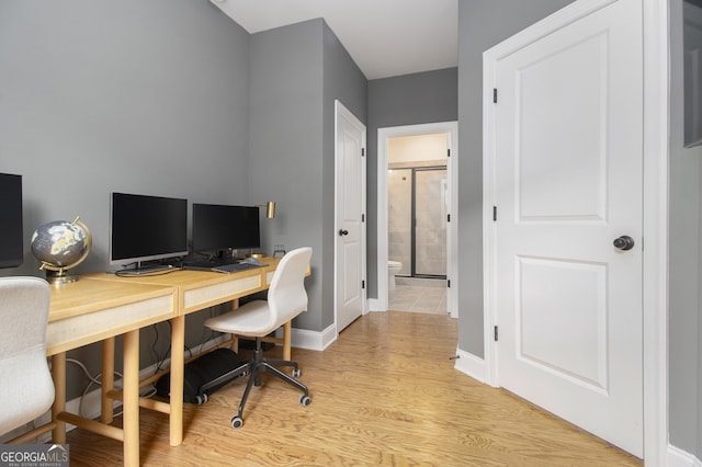 home office featuring light hardwood / wood-style floors